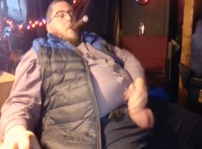 Rotund stud enjoys a cigar while he bates